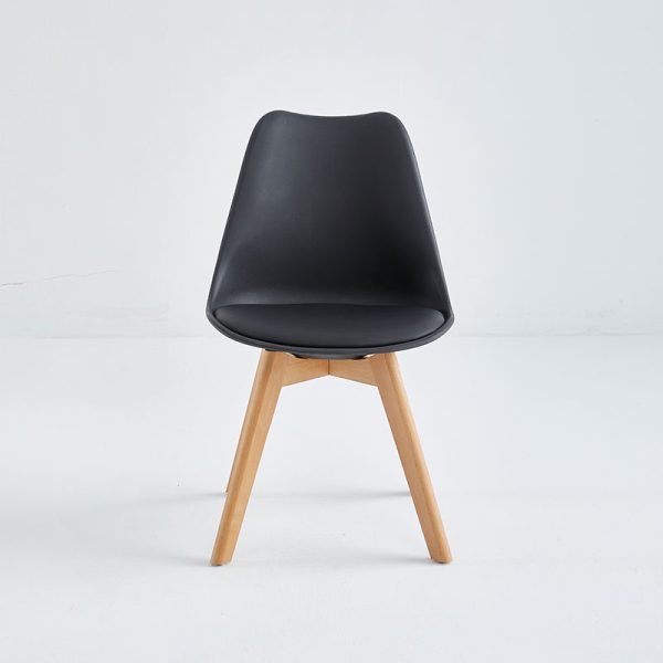 Modern plastic chair with wooden legs for restaurants.