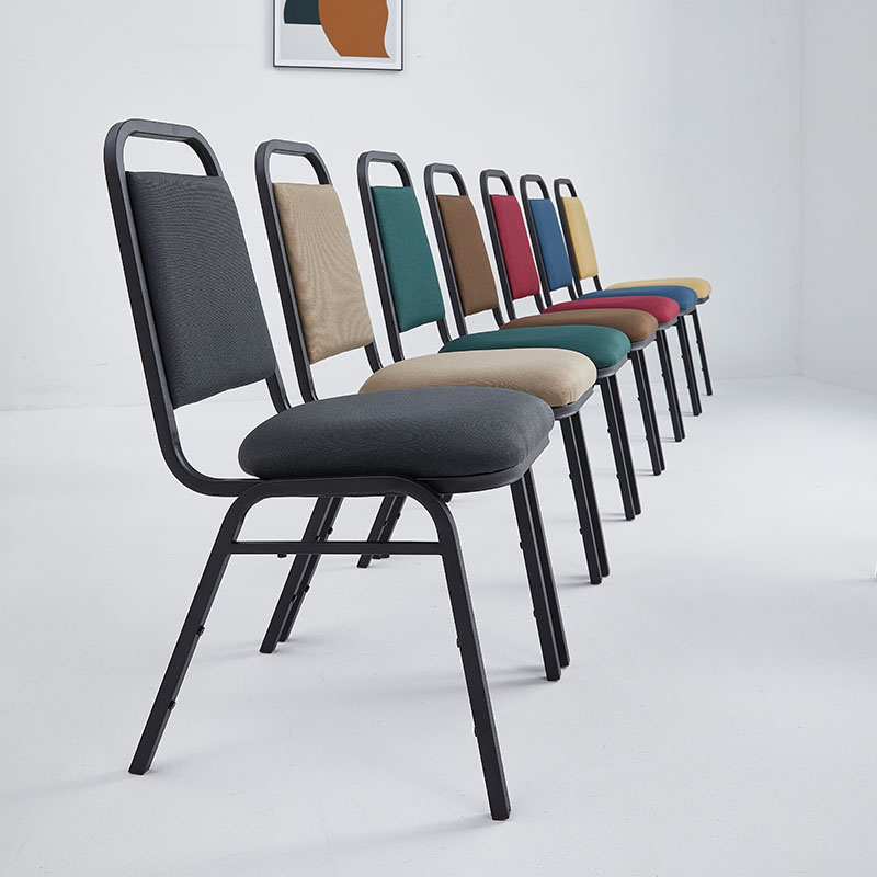 Economic upholstered stacking chairs with a metal frame of every colour lined up.