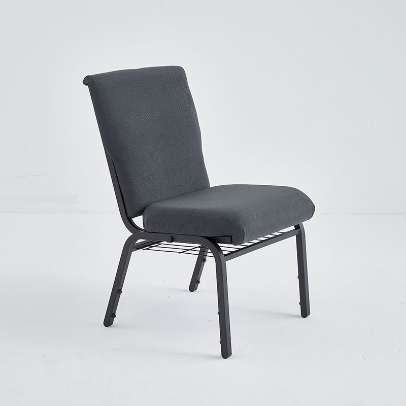 Church chair with grey fabric and a book rack